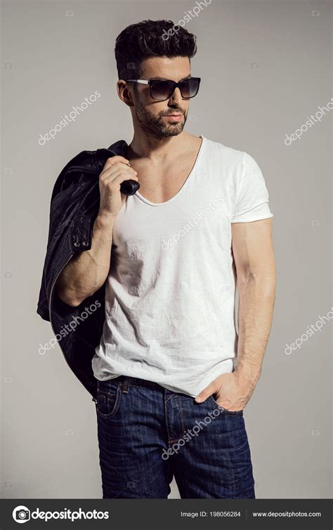 Handsome Man Holding Jacket His Hand Wearing Sunglasses — Stock Photo