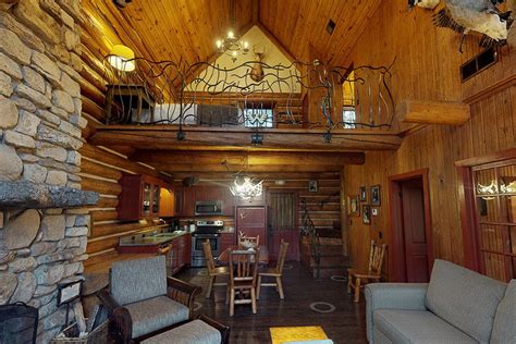 A metal roof with metal accent siding and has pipes for shelving mounts makes this. Private Log Cabins Archives | Big Cedar Lodge