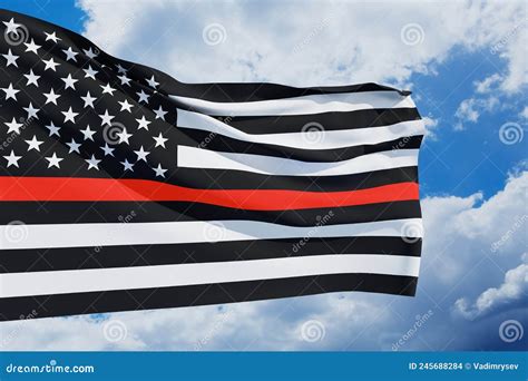 Thin Red Line Firefighter Flag On A Background Of Sky Remembering