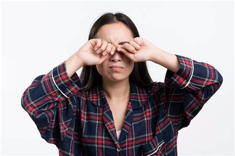 Premium Photo Woman Rubbing Her Eyes