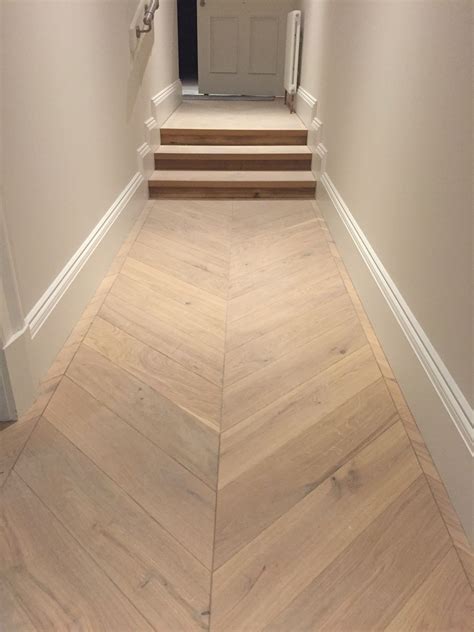 Chevron Parquet Engineered Wood Flooring In Hallway And Bedrooms