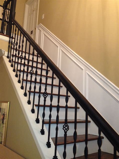 Iron Balusters And Wainscoting Stair Remodel Wrought Iron Stairs