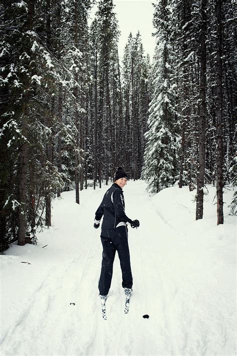 A Lone Woman Cross Country Skis Photograph By Todd Korol