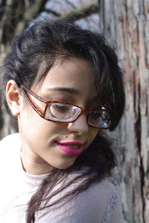 Black Haired Girl Wearing Split Arm Strong Glasses A