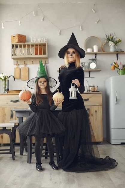 Free Photo Halloween Mother And Daughter In Halloween Costume
