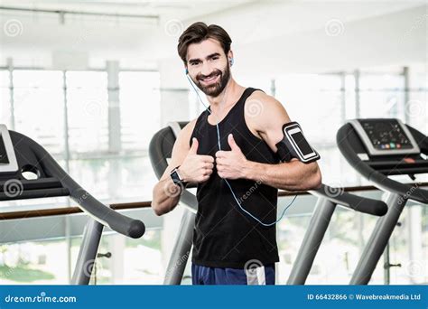 Smiling Man Showing Thumbs Up Stock Photo Image Of Athletic