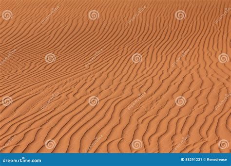 Rippled Red Brown Desert Or Beach Sand Texture Wavy Background Stock