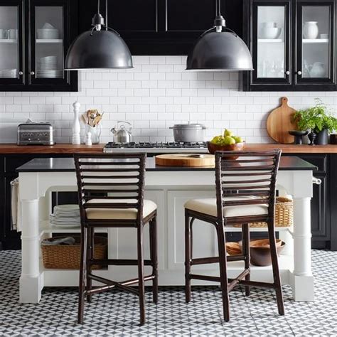 I stopped by a local stone yard, and picked up a thickest piece of granite they. Barrelson White Kitchen Island with Black Granite Top