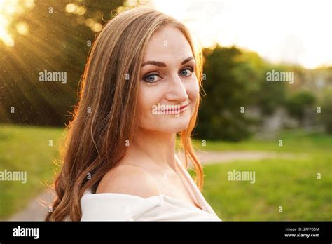 Cute Blonde Girl On Background Of Sun Ordinary Happy Woman Enjoying
