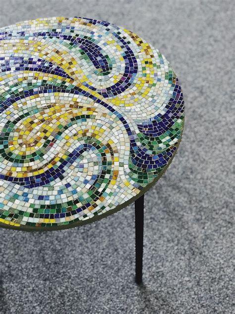 With its mix of materials and finishes, the modus lyon round coffee table blurs the lines between mid. Patio furniture coffee table with abstract mosaic pattern ...