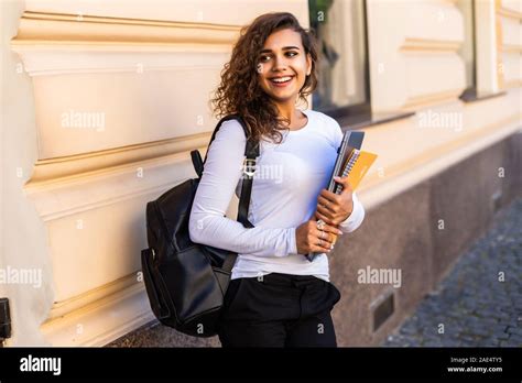 Female College Student With Books Outdoors Smiling School Girl With