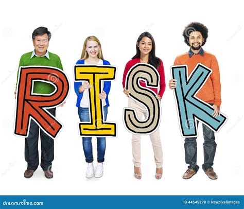 Group Of People Standing Holding Risk Letter Stock Photo Image Of