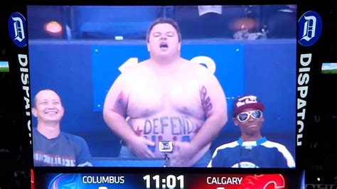 Obese Fan Loses Shirt Busts A Move At Hockey Game