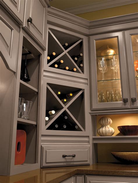 Building a wine rack into an existing kitchen cabinet is an elegant and stylish way to customize your kitchen and show off your perfectly aged wine collection. Built-in Wine Rack Cabinet Storage #schrock #masterbrand # ...