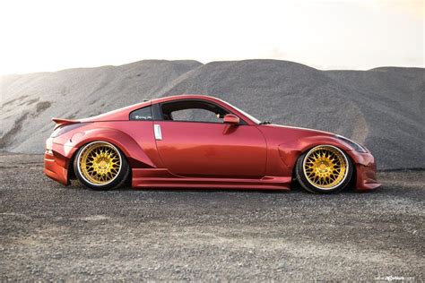 Widebody Red Nissan 350z Stanceda And Put On Gold Avant Garde Wheels