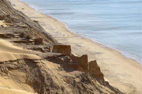 High Angle Shot Of The Sandy Hills On The Shore Of The Sea At Rubjerg