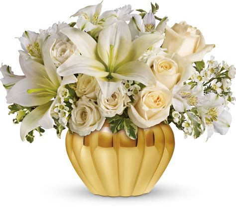 I was asked to use fall colors and yellow spray roses, since that was one of the flowers from their wedding. Teleflora's Touch of Gold-for the in laws 50th wedding ...