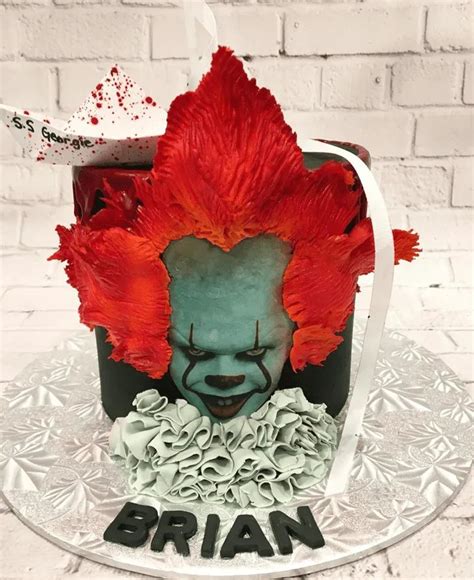 There Is A Cake That Has Been Decorated To Look Like A Clowns Head