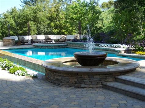 Choosing materials, colors, pool features and determining the ideal inground pool depth for your property, all need to be taken into consideration. Swimming Pool Features | HGTV