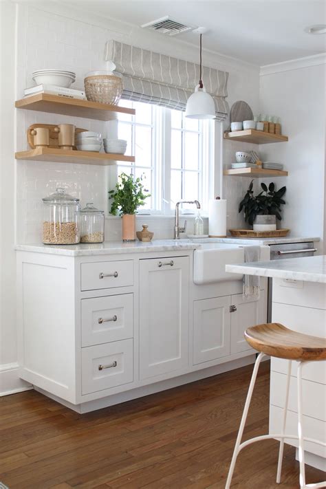 We Love Caitlins Bright White Kitchen With Warm Wood Shelves With