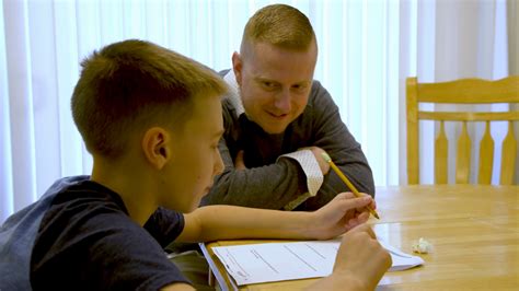 Dad Helps Son With Homework Stock Video Footage Sbv