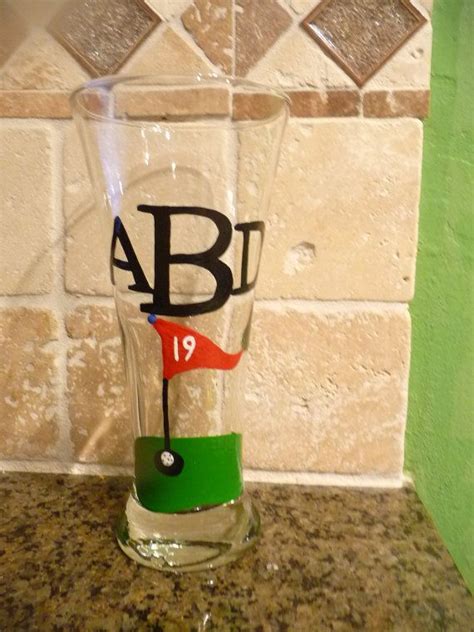 A Glass With The Word Ab On It