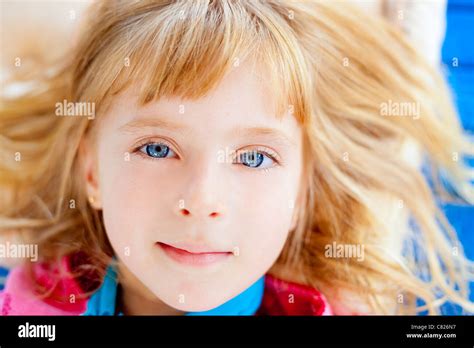 Beautiful Blond Blue Eyes Girl Lying Closeup Face Stock Photo Alamy