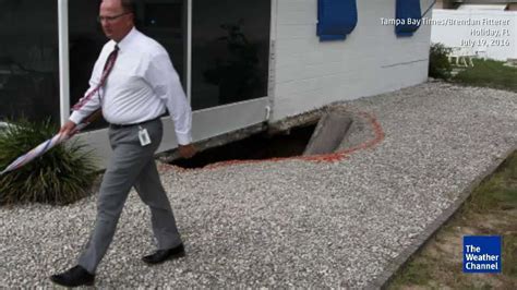 Sinkhole Opens Under Tampa Florida Home Videos From The Weather Channel
