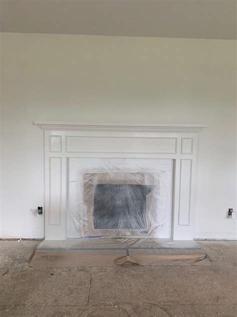 Here's how to paint a tile fireplace. How to Paint a Ceramic Tile Fireplace for an Easy Update ...