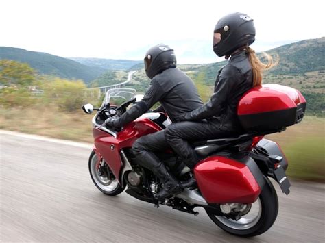 Generally, as a woman motorcycle or scooter rider your passenger's weight will be greater than your own. How to Ride a Motorcycle with a Passenger - autoevolution