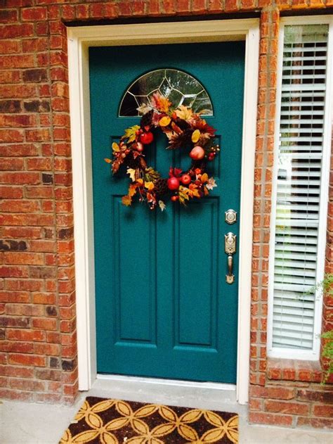 Teal Painted Front Door With Red Bricks The First Thing About This