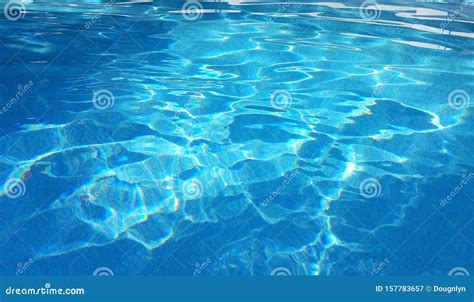 Reflections Of Light In The Water Of A Swimming Pool Stock Image