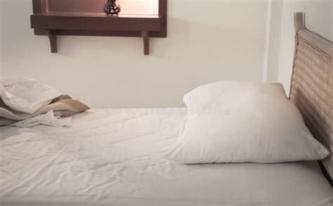 An Unmade Bed With White Linens Stock Image Image Of Radio Drape