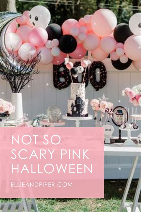 An Outdoor Party With Balloons Cake And Decorations For A Scary Pink