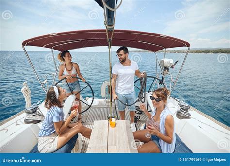 Friends Resting On A Yacht And Having Fun Stock Image Image Of