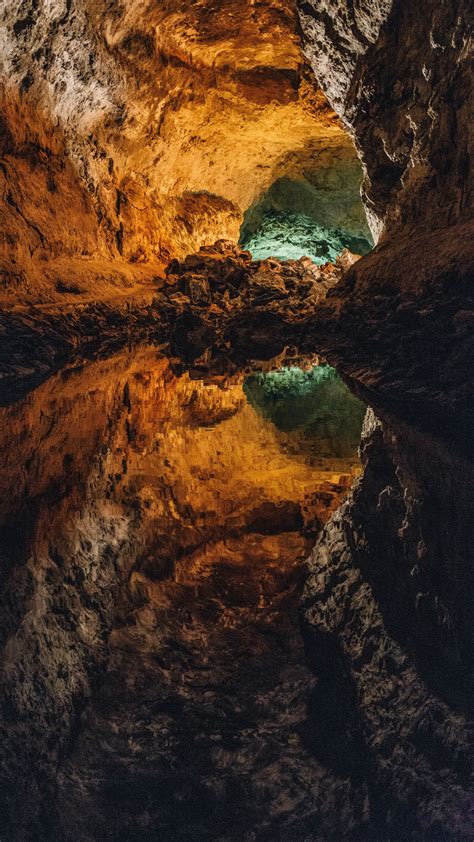 Download Wallpaper 2160x3840 Cave Water Reflection