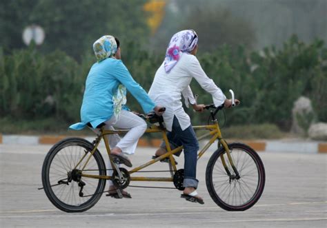 Iranian Press Review Women Riding Bikes And Men Preparing For War