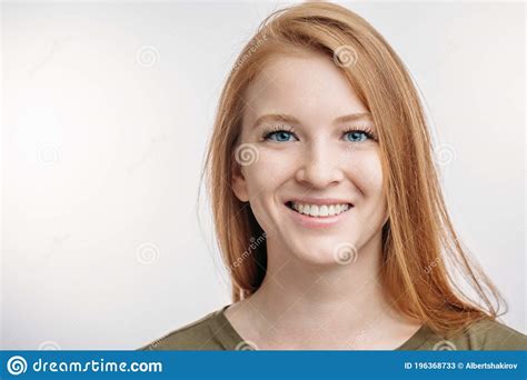 A Cheerful Gorgeous Ginger Woman Wearing Her Hair Loose Stock Image