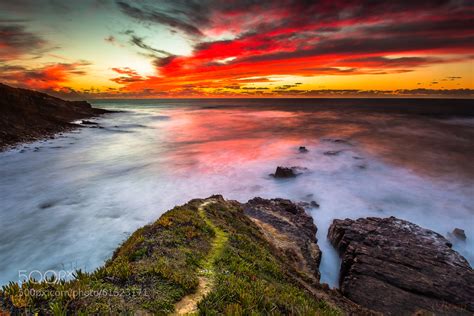 A Breathtaking Sunset Off The Coast Of Portugal Photo By Agostinho