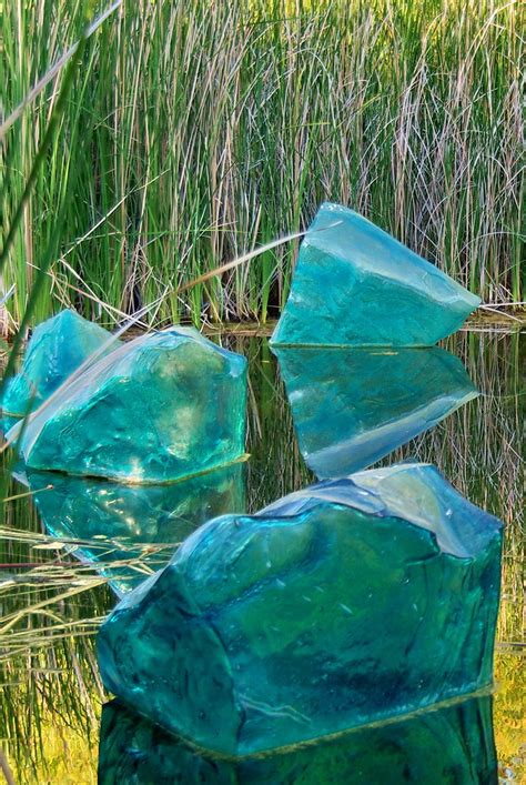 Live glass demonstrations, free digital photos, gallery talks. Chihuly Blue Polyvitro Glass Rocks in lagoon - Desert Bota ...