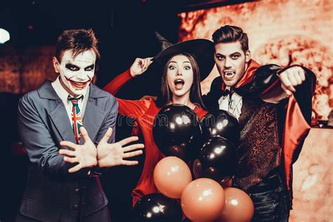 Young People In Costumes Celebrating Halloween Stock Image Image Of