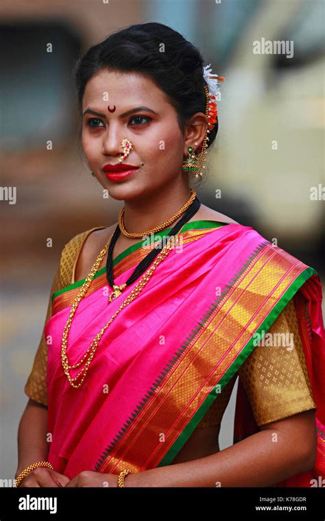 Indian Maharashtrian Woman In Traditional Silk Red Saree Gold Necklace Pearl Nose Ring India