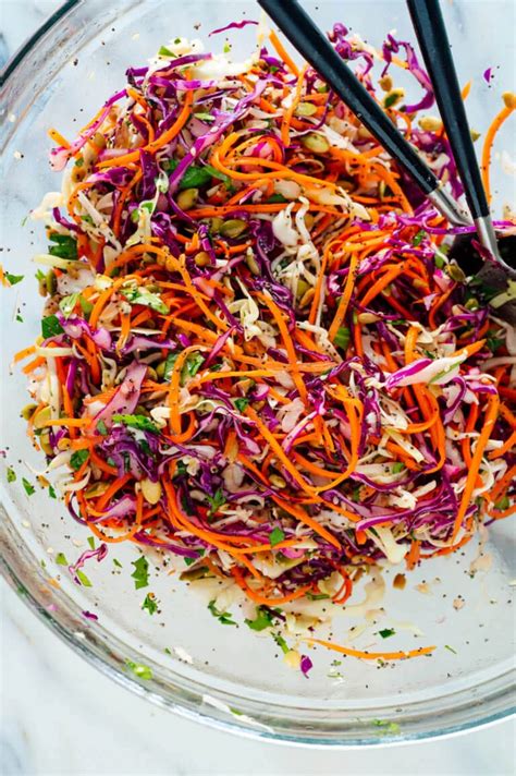 In a medium serving bowl, combine the shredded purple and green cabbage, grated carrots and chopped parsley. Pin on Recipes II - Salads