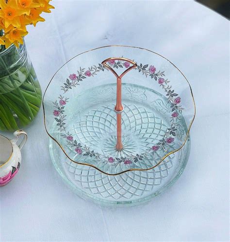 This baby rattle cake has a fun, modern design with several circles and rings covering its surface. Two Tier Cake Stand Glass Cake Stand Baby Shower | Etsy ...