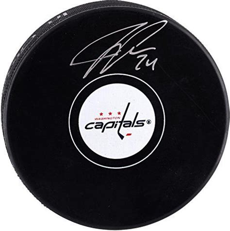 • this coffee table is made of broken hockey sticks. John Carlson Washington Capitals Autographed Hockey Puck ...