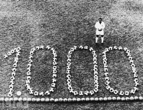 Pelé Stands Beside A Display Celebrating His 1000th Professional Goal
