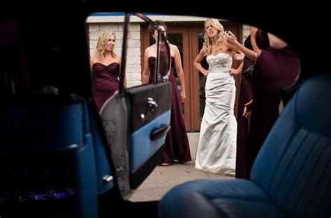 Memorable Wedding Photography Bride Pouts Outside Of Wedding Car