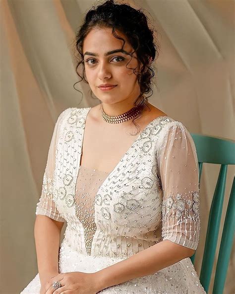 Nithya Menen Exposing Hot Photos Gallery Nithya Menon Looking Very Beautiful And Glamorous