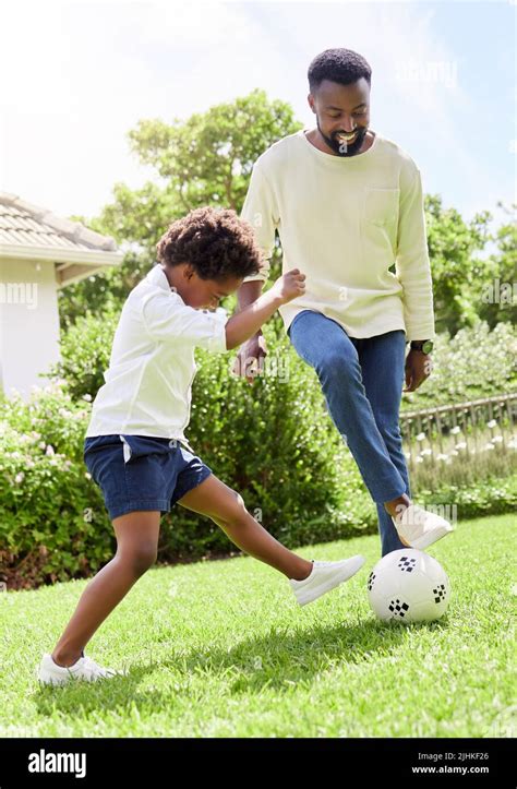 Hes Going To Tackle Dad For The Ball A Father And Son Playing Soccer