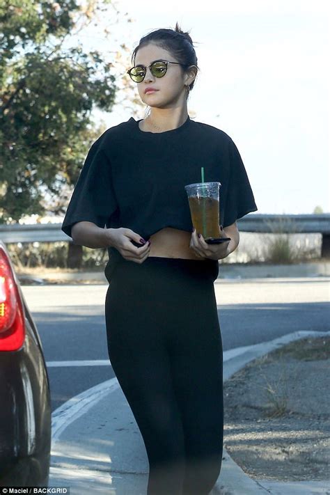 Selena Gomez Flashes A Bit Of Midriff Grabbing Starbucks Daily Mail